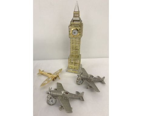 2 novelty metal clocks in the shape of aeroplanes with moving propellers. Together with a figurine of Big Ben set with clock 