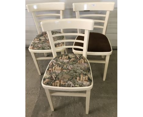3 vintage curve backed kitchen chairs painted white.  
