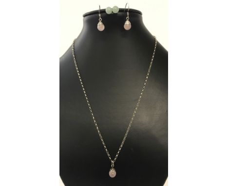 A silver pendant and chain set with rose quartz  and matching earrings. Together with a pair of silver earrings set with jade