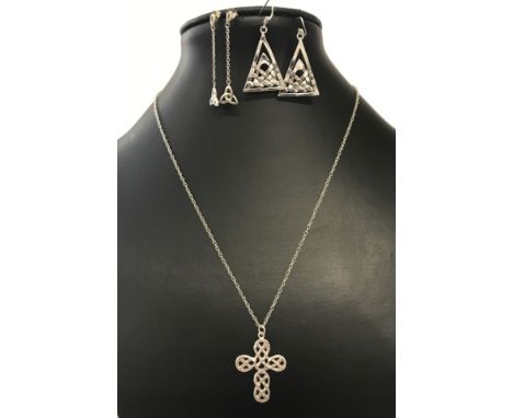 A silver cross and chain and 2 pairs of silver earrings all in a Celtic design. Cross measures approx 3.5cm x 2.5cm. 
