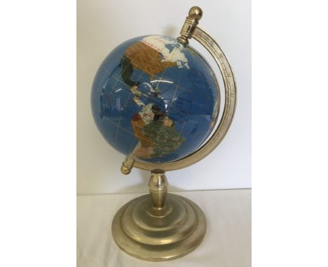 A natural stone globe.  Approx 41cm tall.