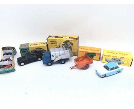 A Boxed Corgi Riley Pathfinder Police Car #209. A Dinky Land-Rover Trailer #341. A Dinky Triumph Herald #189 And A Budgie Ref