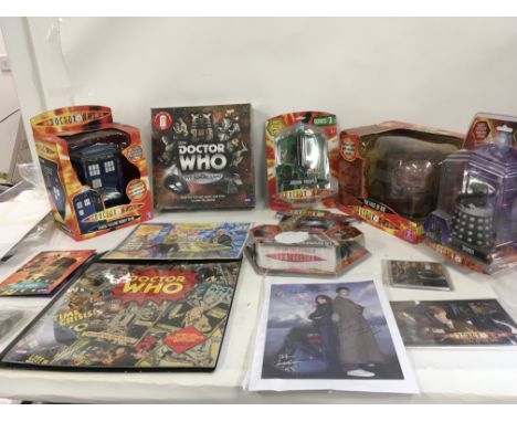 A collection of unopened boxed Dr Who Toys plus other items comprising Tardis Talking Moneybank. The Face of Boe with moveabl