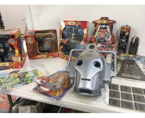 A collection of boxed Dr Who toys including Electronic Flight Control Tardis. The face of Boe with moveable mouth. Micro univ