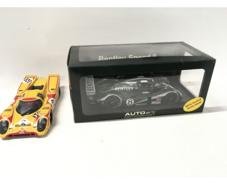 2x Autoart motorsport models includes boxed Bentley Speed 8 Le Mans 2003 with green livery.. Also unboxed Porsche 917K Martin