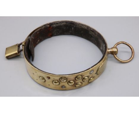 C19th leather lined brass adjustable dog collar, with studded decoration, vacant cartouche, ring and padlock, D15cm max 
