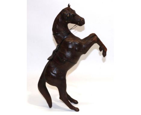 Brown leather covered model of a rearing horse, H45cm 
