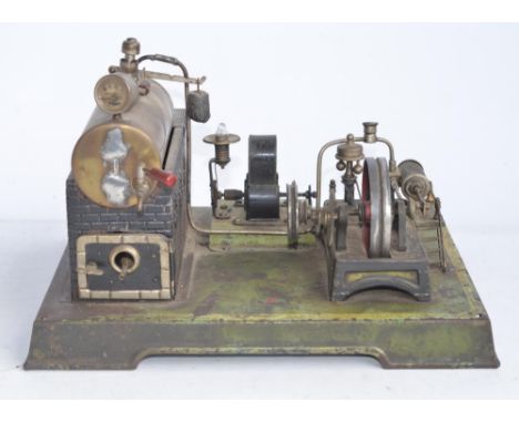 DC Doll &amp; Cie of Nuremberg tinplate stationary horizontal steam engine scale layout with 2 volt generator, lack chimney s