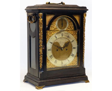 John Wilmer London -  C18th fruitwood bracket clock, moulded case with twin carrying handles over circular and concave glazed