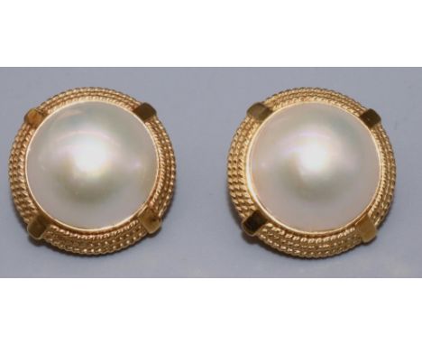 Pair of 18ct yellow gold Mabe pearl set earrings with rope twist surrounds on clip backs, stamped 18k, 9.4g 