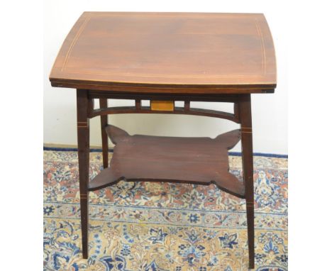 Liberty style boxwood strung mahogany card table, rectangular swivel folding baize lined top above pierced frieze with Art No