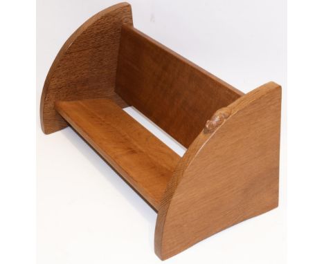 Robert Mouseman Thompson of Kilburn - an oak book trough, single shelf with shaped ends, carved with signature mouse, W46cm D