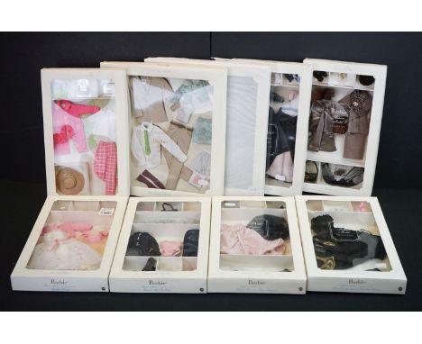Nine boxed Mattel Barbie Fashion Model Collection outfits to include 2 x New England Escape Barbie and Ken, Black Enchantment