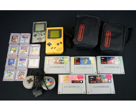 Retro gaming - Two Nintendo Game Boy consoles in cases (including a transparent Game Boy pocket console), together with 10 ga