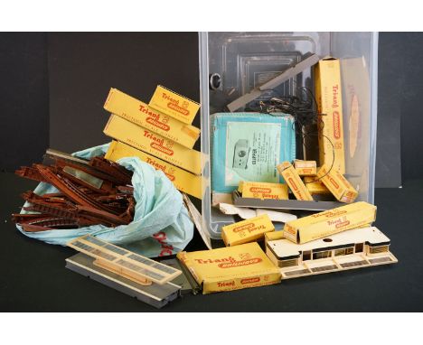 Quantity of Triang TT Gauge model railway to include 12 x boxed items of rolling stock, platform trackside buildings, track e