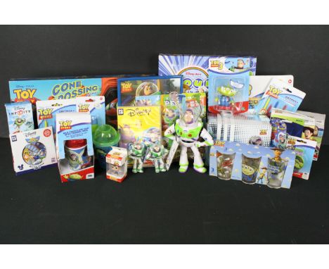 Collection of Toy Story toys featuring 2 x carded Pez Dispensers, carded Magic Scribbler, carded Alien Figure, carded birthda