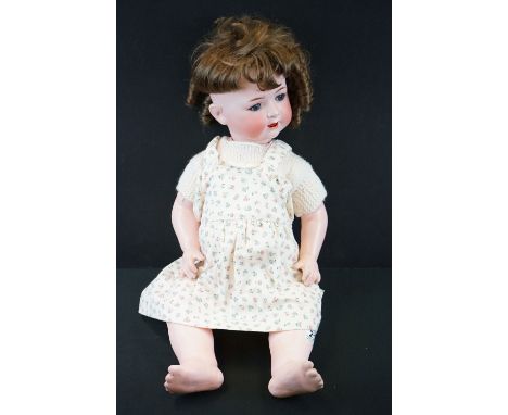 Early 20th C Heubach Koppelsdorf bisque headed doll with blue glass eyes, teeth, wig loose from head, marked 321 8, 24" appro