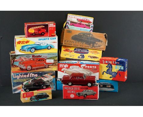 12 Boxed plastic and metal models to include Minister Deluxe in black, Friction Drive Rolls Royce Silver Cloud in black, Mett