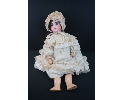 Bebe Jumeau bisque headed doll with sleeping blue glass eyes, painted face, marked 11 to back of neck, finger missing, some w