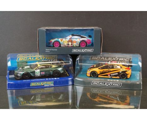 Three Cased / boxed Scalextric slot cars to include Scalextric Digital C2544D Aston Martin DBR9 No 57, C3838 1:32 Team GT Sun