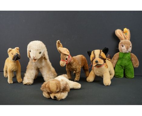 Six mid 20th C soft toy animals to include 3 x Steiff (lamb with tag/button to ear, lying down dog with button/tag to ear and