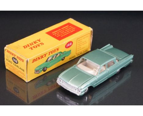 Boxed Dinky 148 Ford Fairlane diecast model in metallic green with off white interior, vg with fair-gd box 