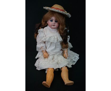 Armand Marseille bisque headed doll marked 1894 2 DEP to neck, sleeping blue glass eyes, teeth, loose legs on string, loose w