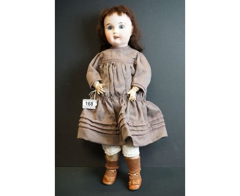 Limoges France bisque headed doll with blue glass eyes, original hair and clothing, marked AL &amp; Cie A8 to neck, paint los