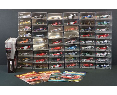 50 Cased F1 Formula One World Championship Grand Prix diecast models to include Tyrrell 006 - 1973 Jackie Stewart, Williams F
