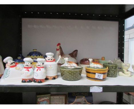 A shelf of miscellaneous including butter dishes etc