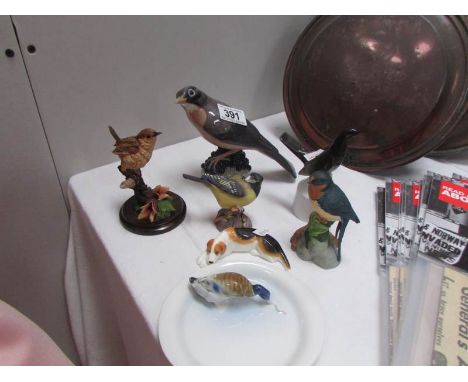 A Royal Copenhagen bird, A Country artists bird, A Spode Bird, A Royal Worcester bird, a Royal Worcester bird pie funnel and 