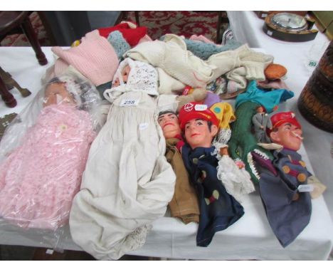 A quantity of vintage dolls and puppets