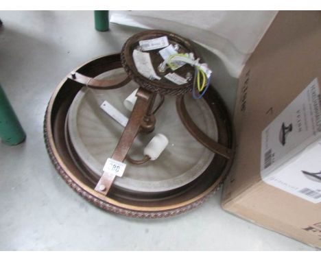A modern ceiling light with box