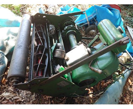 Vintage Dennis Brothers petrol lawn mover MK1 motor mower to label, green in colour
Located behind the swimming pool, as foun