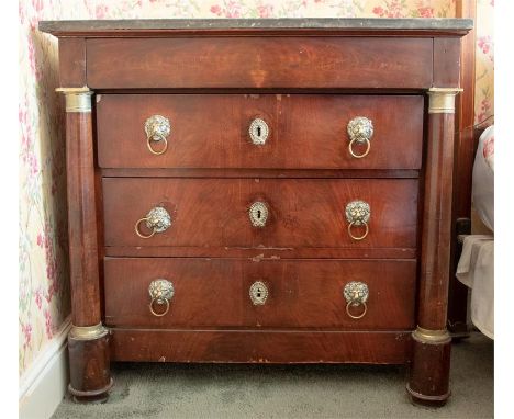 A 19th Century flame mahogany washstand of Empire design, grey veined marble top, frieze drawer over three long graduated dra