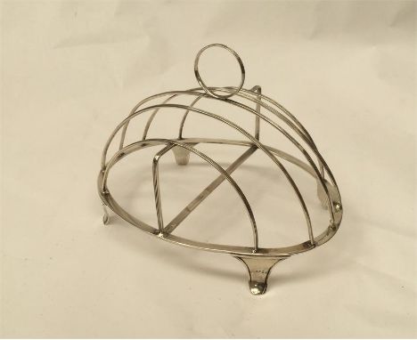 A George III silver four division toast rack, by Henry Chawner, London 1790,&nbsp; of elliptical form,&nbsp;having domed ribb