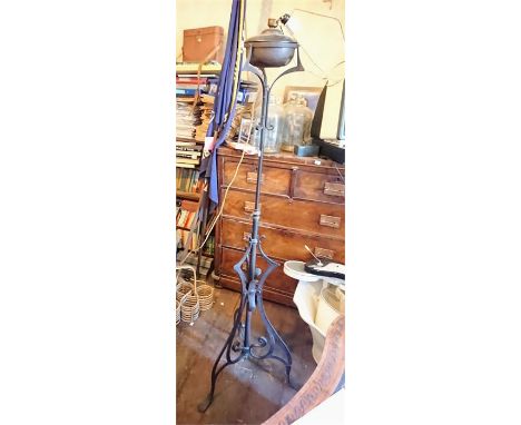 A late 19th/early 20th Century wrought iron gas standard lamp, adjustable height&nbsp;