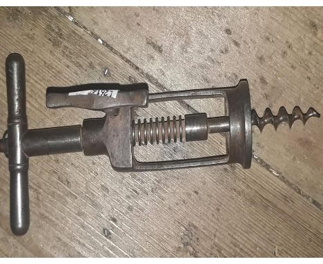 A 19th century steel open barrel rack corkscrew with single helix.
