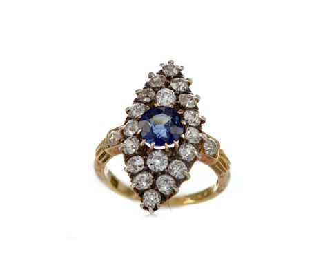 BLUE GEM SET DIAMOND RING, the navette shaped bezel set with a round blue gem and Old Mine cut diamonds, the diamonds totalli