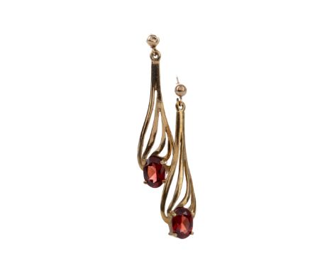 PAIR OF GARNET EARRINGS, set with oval garnets, along with a ring of similar design, size O 1/2, each in nine carat gold, 5.1