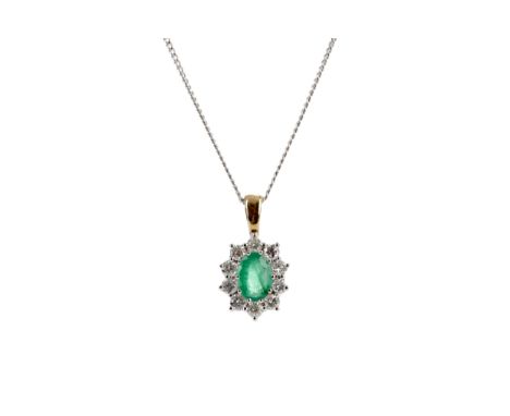 EMERALD AND DIAMOND PENDANT, set with an oval emerald of approximately 1.00 carat, within a halo of round brilliant cut diamo