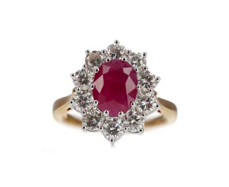 RUBY AND DIAMOND CLUSTER RING, set with a central oval ruby of approximately 2.25 carats, within a halo of round brilliant cu