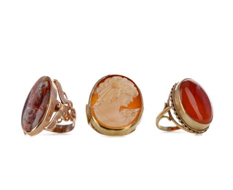 THREE DRESS RINGS, including an agate, size Q 1/2, cameo, size P 1/2, and orange hardstone, size O, each in nine carat gold, 