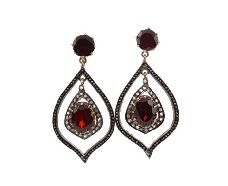 PAIR OF GARNET AND DIAMOND EARRINGS, set with round and oval garnets and round brilliant cut diamonds, 45mm long, in silver, 