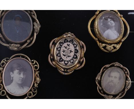 FIVE YELLOW METAL NINETEENTH CENTURY BROOCHES, including four portrait examples and one mourning brooch with hairwork to the 
