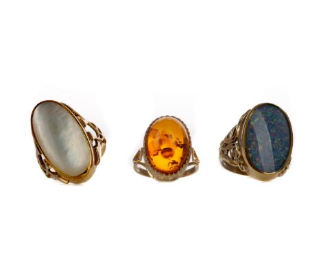 OPAL DOUBLET RING, in nine carat gold, size Q 1/2, along with a nine carat gold mother of pearl ring, size R 1/2 and a nine c