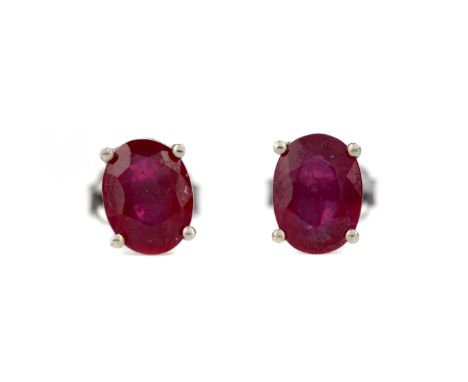 PAIR OF TREATED RUBY EARRINGS, set with oval treated rubies 7.6mm long, in silver, 1.9g