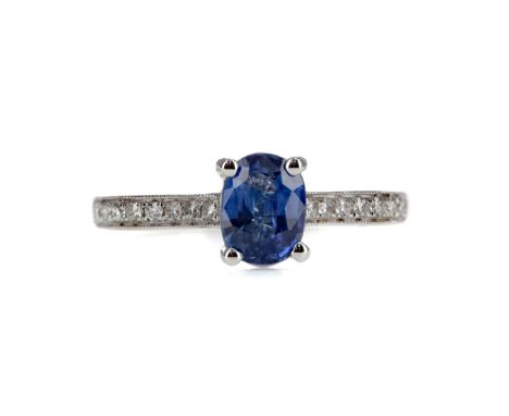 SAPPHIRE AND DIAMOND RING, the oval sapphire of approximately 1.25 carats, on diamond shoulders, in eighteen carat white gold