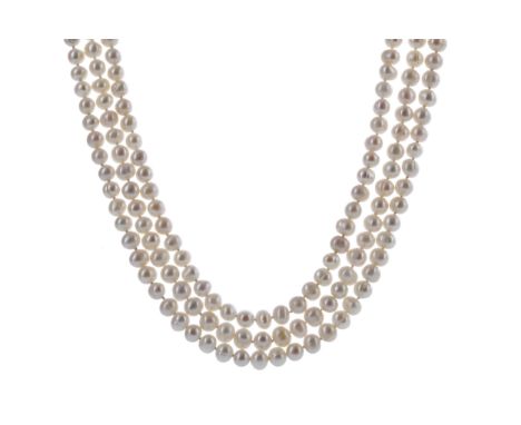 PEARL NECKLACE, formed by three strands, approximately 46cm long, with metal clasp