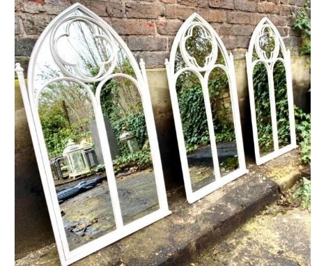 ARCHITECTURAL GARDEN WALL MIRRORS, three, 103cm x 54cm, white painted Gothic revival style. (3) 
